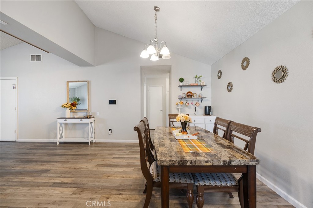 638 Eston Place Lancaster, CA 93535 - Photo 20 of 44 a view of a dining room with furniture