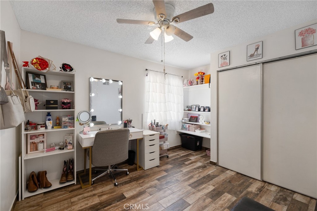 638 Eston Place Lancaster, CA 93535 - Photo 27 of 44 a workspace with furniture and white walls