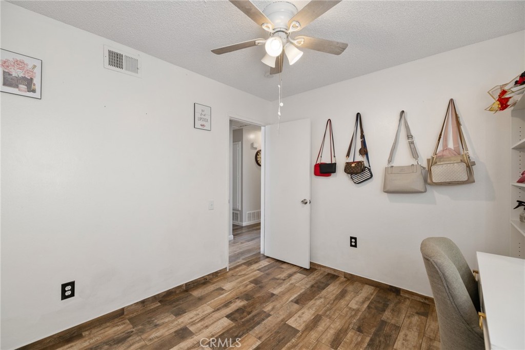 638 Eston Place Lancaster, CA 93535 - Photo 28 of 44 a view of a bedroom with closet and mirror