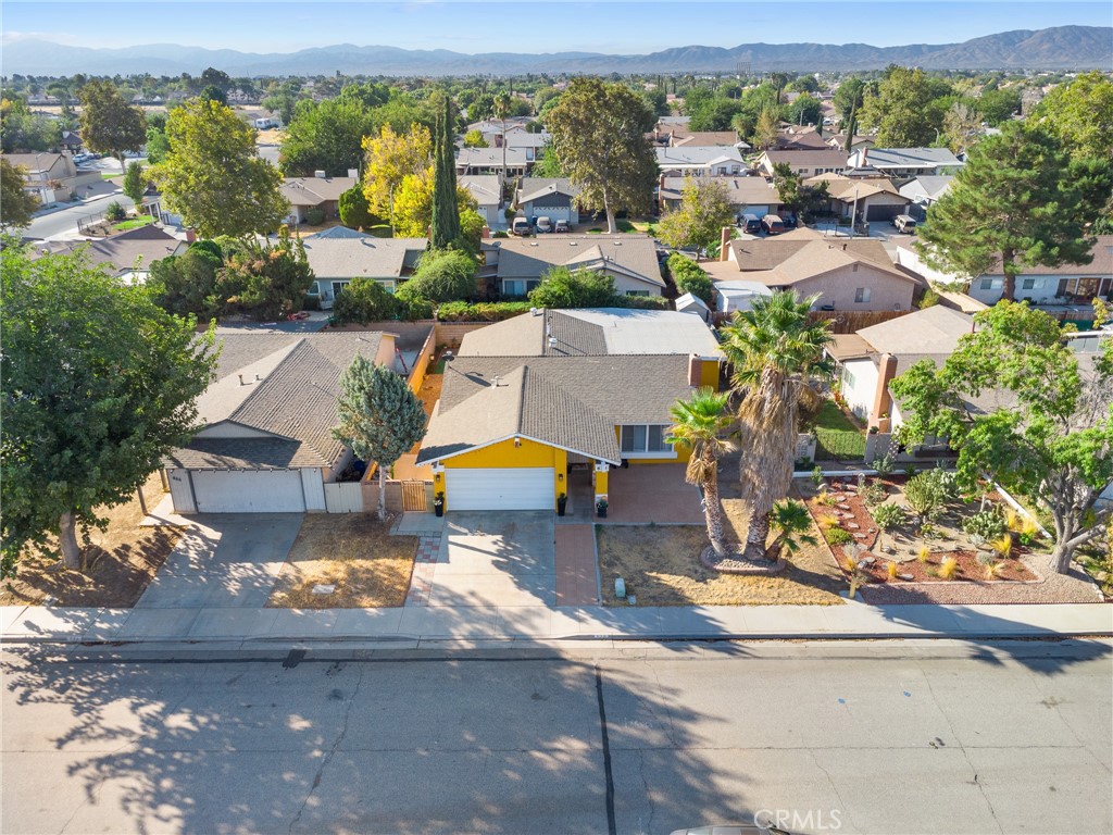 638 Eston Place Lancaster, CA 93535 - Photo 41 of 44 an aerial view of a house with a swimming pool
