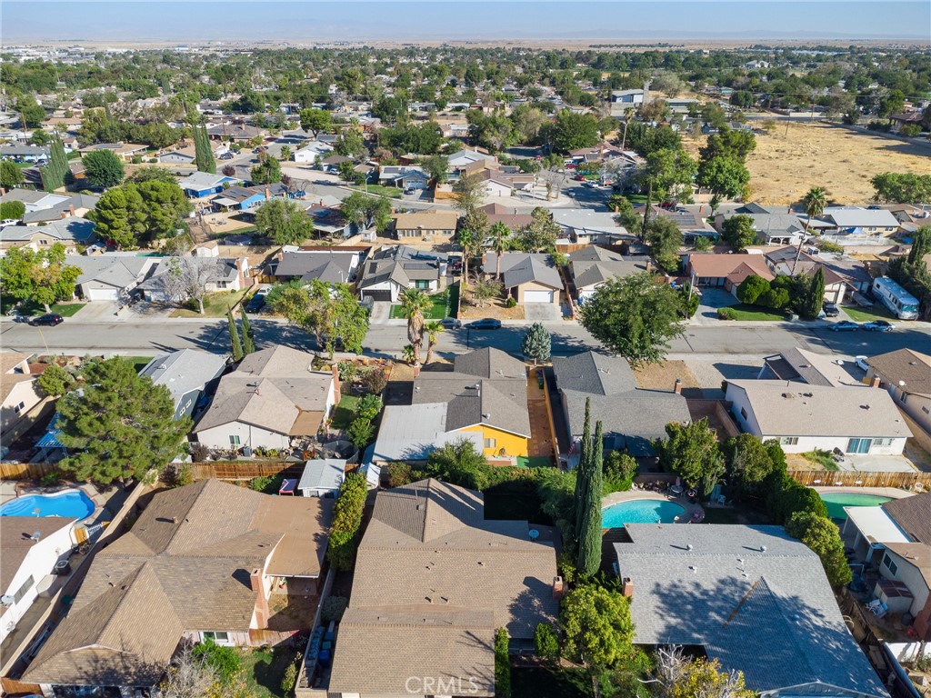 638 Eston Place Lancaster, CA 93535 - Photo 44 of 44 an aerial view of a city with lots of residential buildings