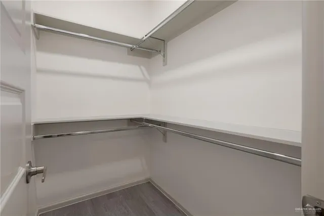 a view of a room with racks on the wall