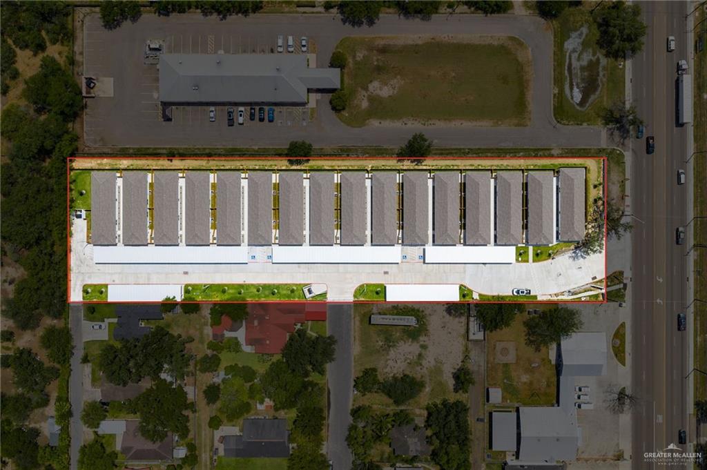 740 North Alamo Road, Unit 2 Alamo, TX 78516 - Photo 20 of 24 a view of building with swimming pool