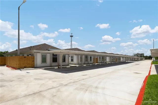a front view of a house with yard