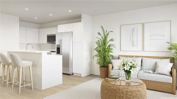 a living room with furniture and a potted plant