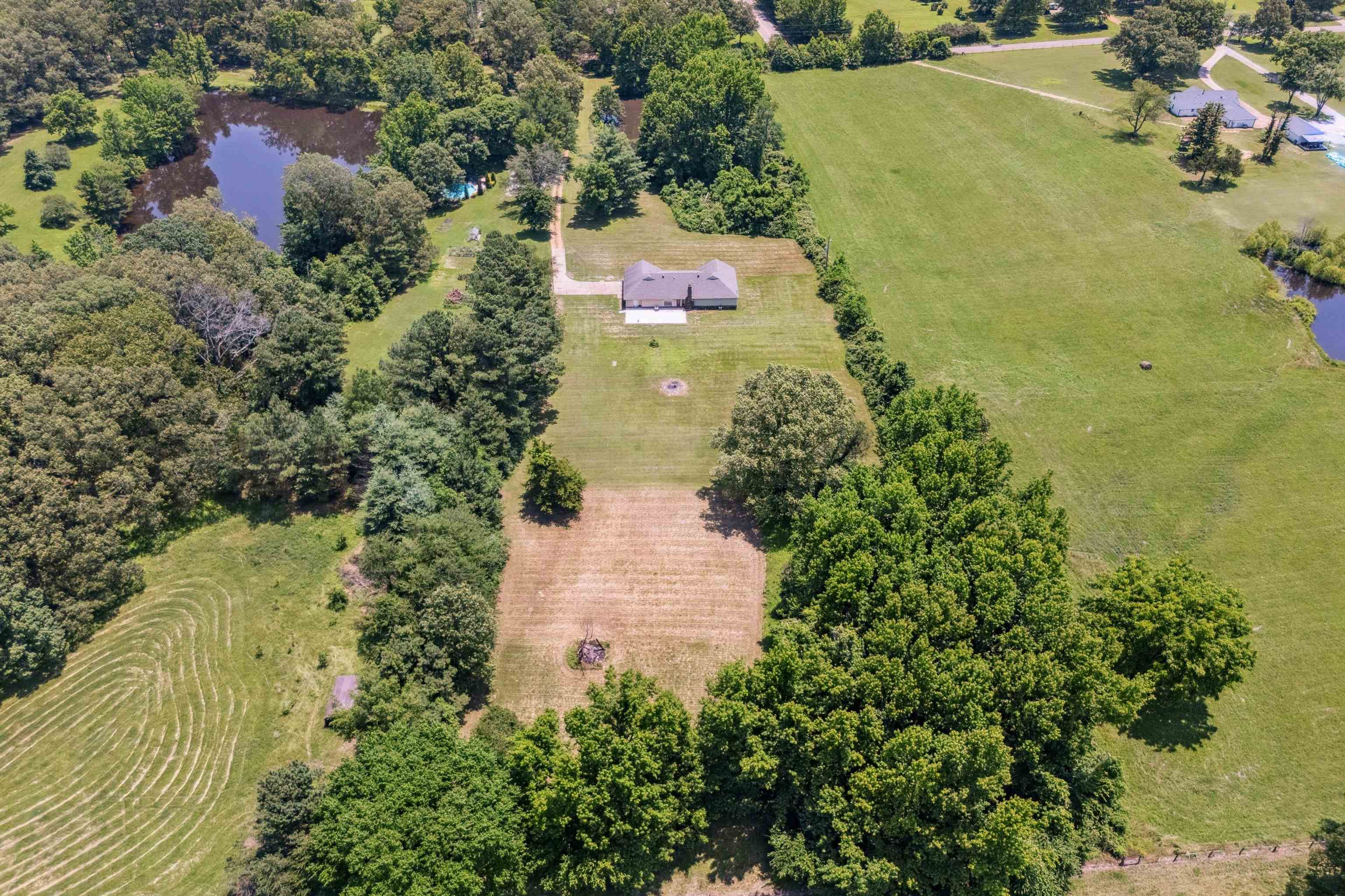 8783 Deadfall Road Millington, TN 38053 - Photo 16 of 27 Overview of rural landscape featuring a nearby body of water