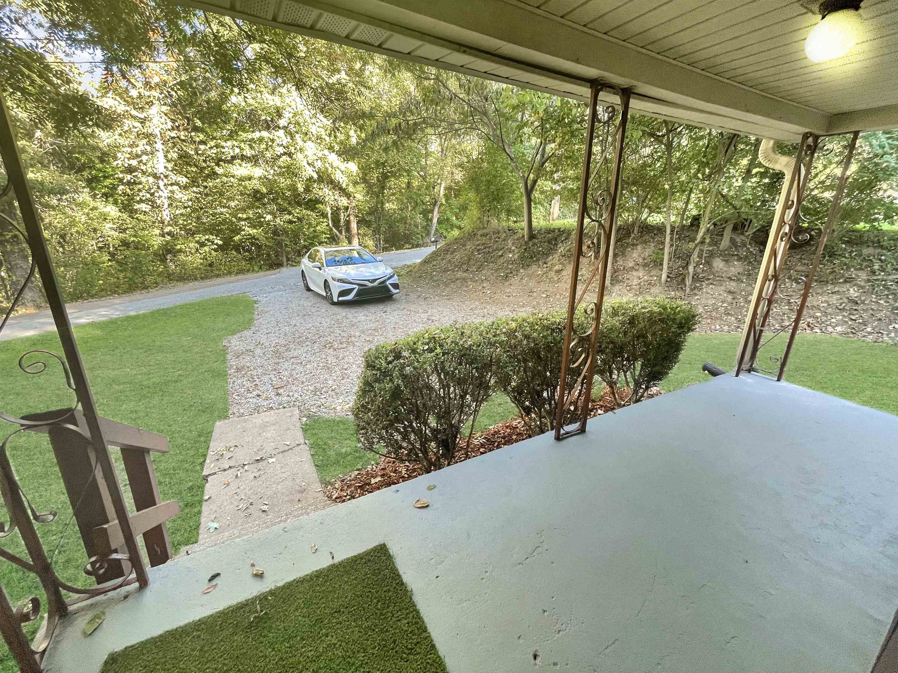 210 Tichenor Street Ripley, TN 38063 - Photo 4 of 10 a view of a porch with furniture
