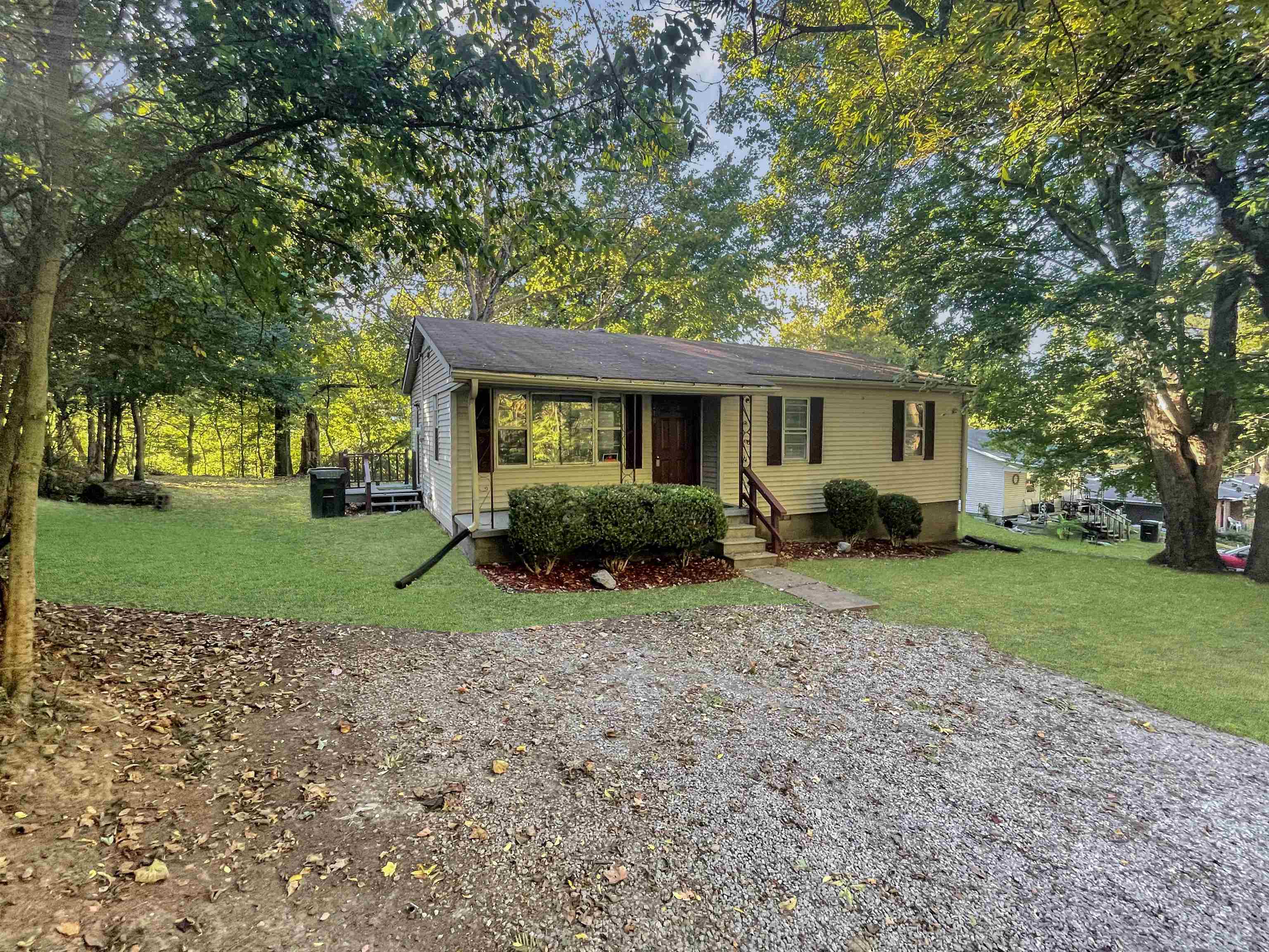 210 Tichenor Street Ripley, TN 38063 - Photo 9 of 10 a view of a house with a backyard