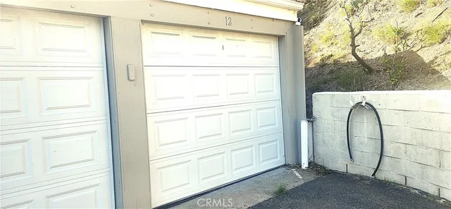 a view of front door and utility room