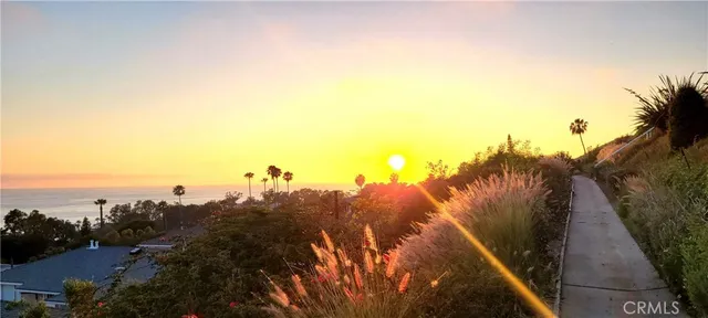 a view of a swimming pool and a chairs