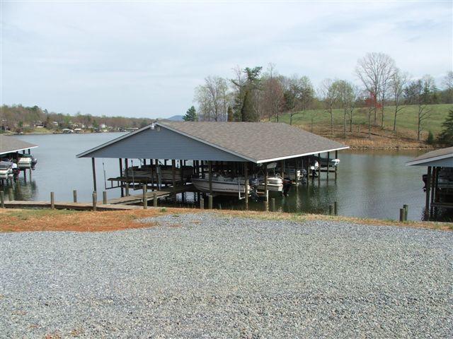 260 Mallard Point Road Wirtz, VA 24184 - Photo 5 of 7 a house with river in front of it