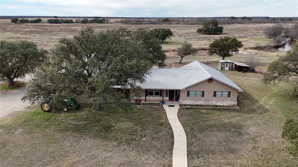 6500 A Farm To Market 586 Bangs, TX 76823 - Photo 1 of 40 an aerial view of a house with pool table and chairs