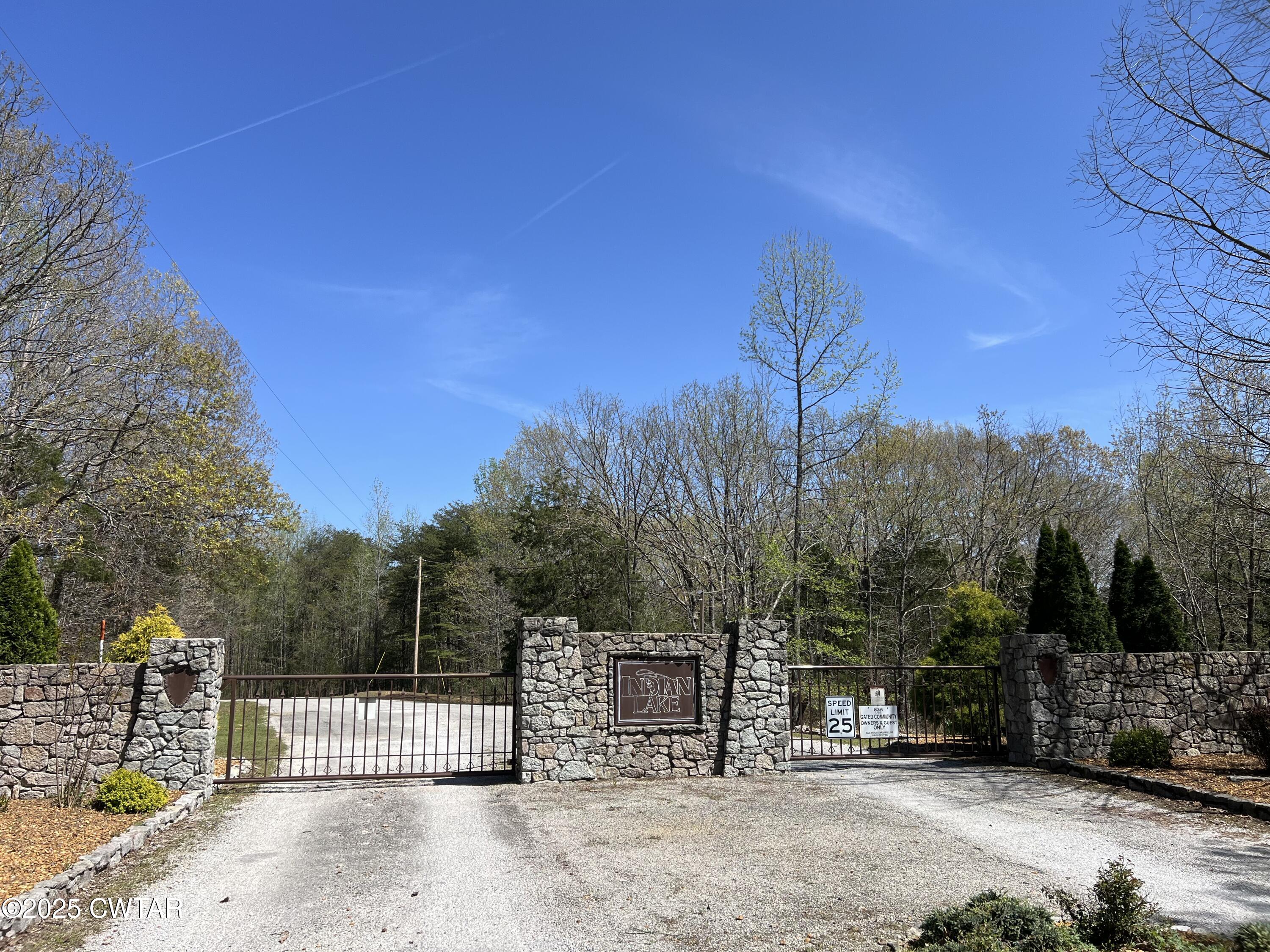 1240 Strike King Drive Cedar Grove, TN 38321 - Photo 16 of 16 a view of a wrought iron fences in front of house