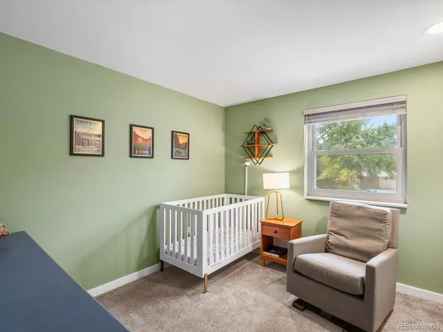 a room with furniture and a window