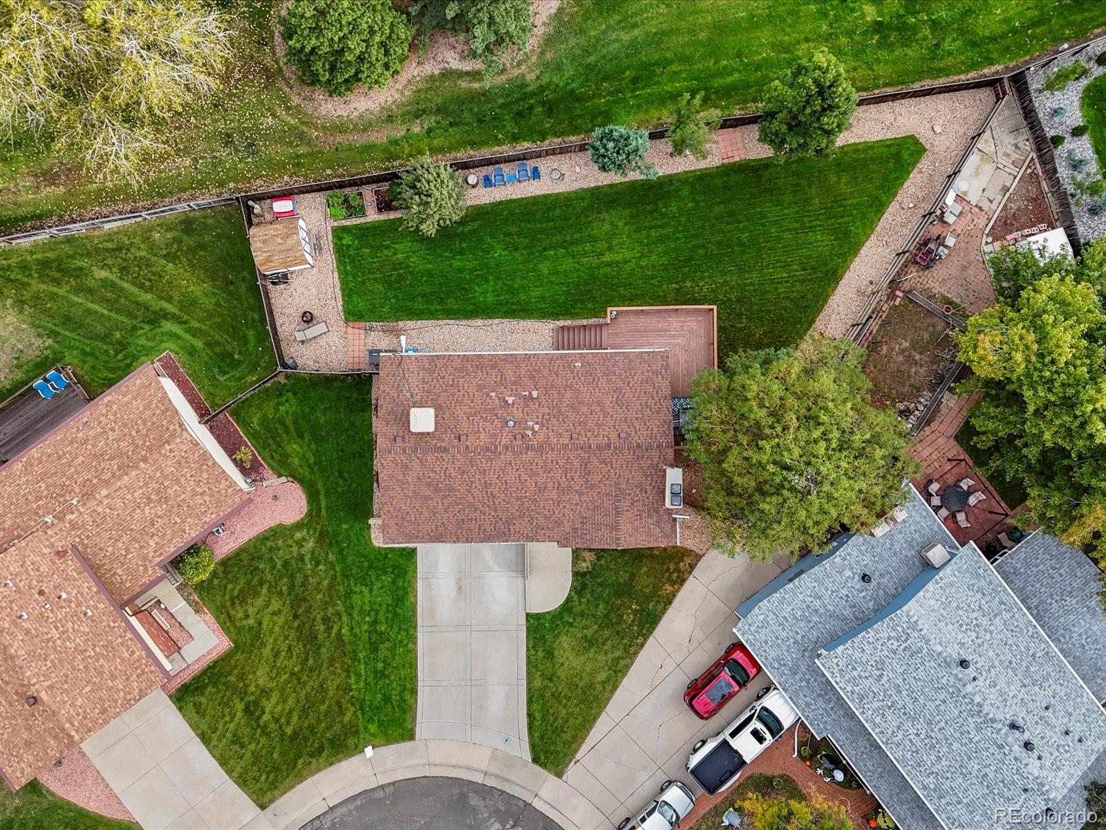 8324 Everett Way Arvada, CO 80005 - Photo 26 of 39 an aerial view of a house with a garden