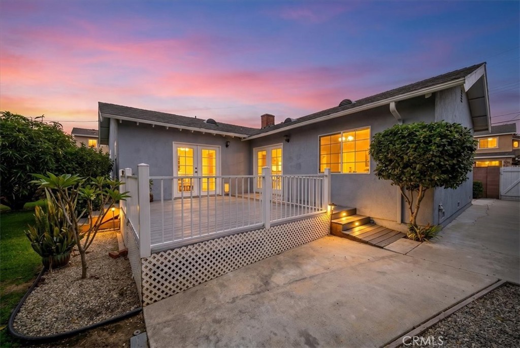6481 Dos Rios Road Downey, CA 90240 - Photo 16 of 27 a view of a living room with a patio