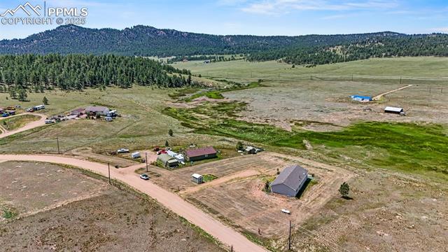 567 High Pasture Road Florissant, CO 80816 - Photo 44 of 48 Aerial view of area with mountains