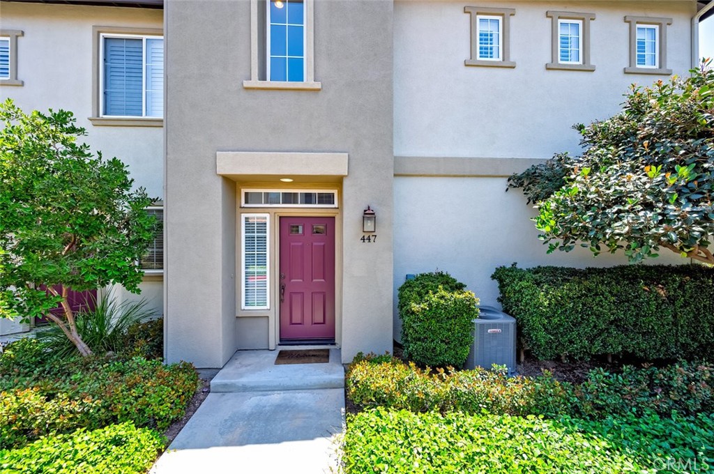 447 Ridgeway Irvine, CA 92620 - Photo 5 of 88 a front view of a house with a yard