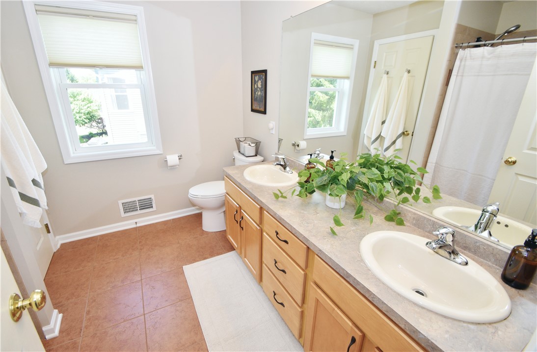 41 Ketchum Street Victor, NY 14564 - Photo 21 of 36 Primary attached bath with walk in shower & linen closet.