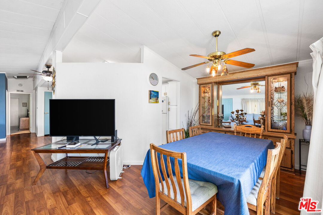 74711 Dillon Road, Unit 503 Desert Hot Springs, CA 92241 - Photo 14 of 52 a living room with furniture and a flat screen tv