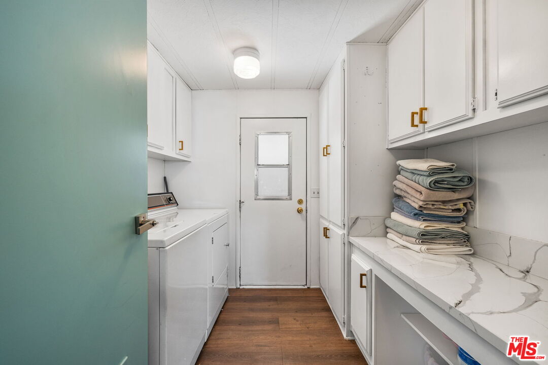 74711 Dillon Road, Unit 503 Desert Hot Springs, CA 92241 - Photo 17 of 52 a hallway with washer and dryer