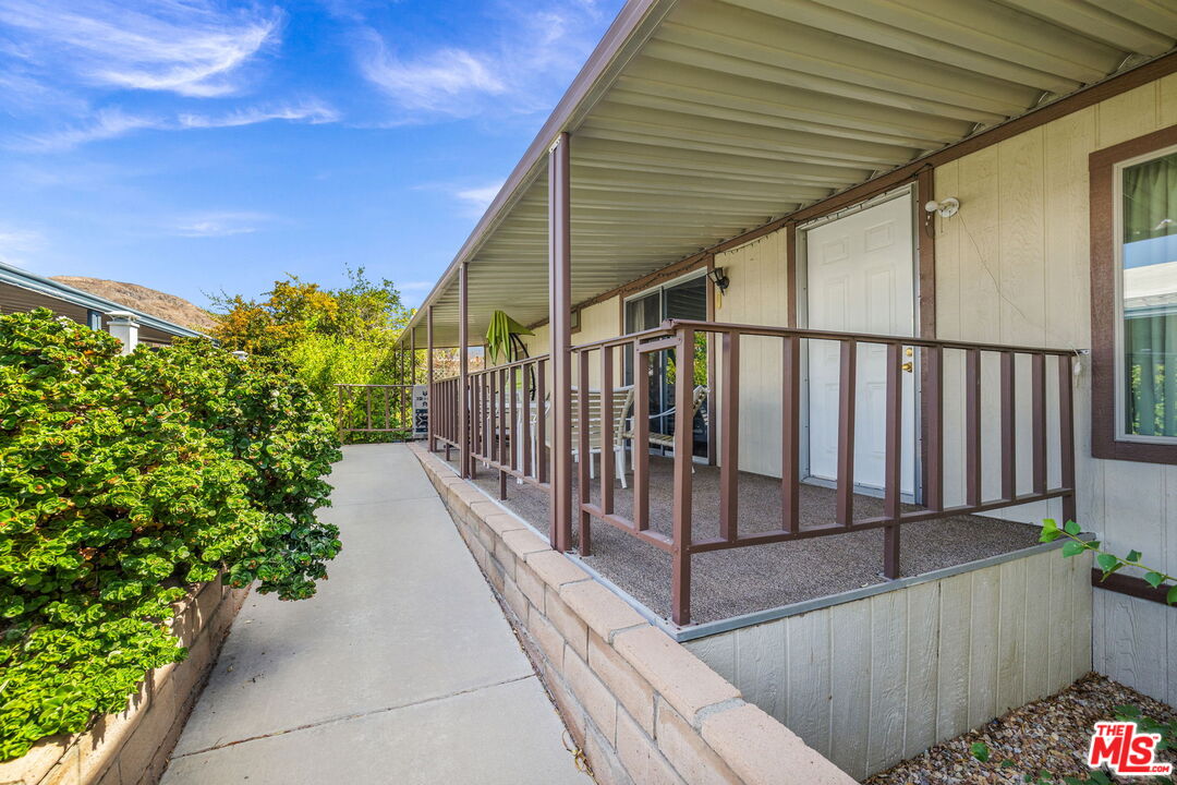 74711 Dillon Road, Unit 503 Desert Hot Springs, CA 92241 - Photo 23 of 52 a view of a balcony with staircase