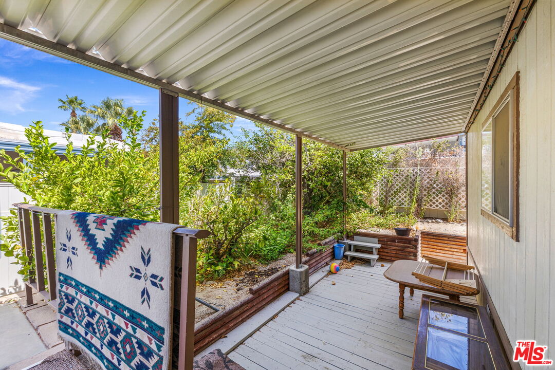 74711 Dillon Road, Unit 503 Desert Hot Springs, CA 92241 - Photo 29 of 52 a view of a two chairs in the balcony