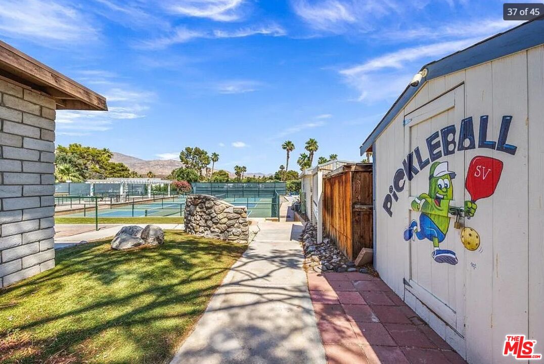 74711 Dillon Road, Unit 503 Desert Hot Springs, CA 92241 - Photo 40 of 52 a view of swimming pool with outdoor seating