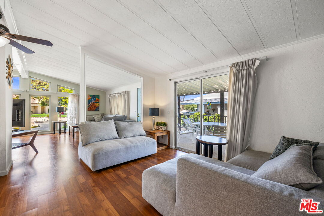 74711 Dillon Road, Unit 503 Desert Hot Springs, CA 92241 - Photo 7 of 52 a living room with furniture and a large window