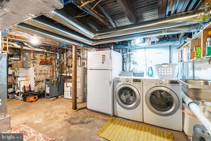 419 North Olive Street Media, PA 19063 - Photo 30 of 31 a utility room with dryer and washer