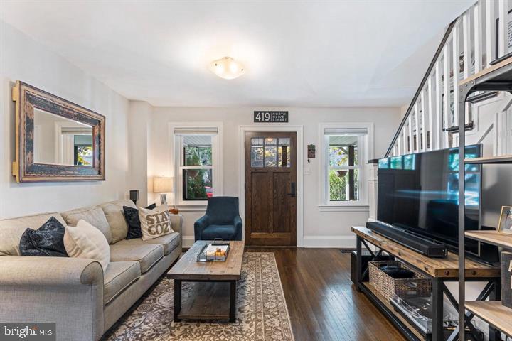 419 North Olive Street Media, PA 19063 - Photo 3 of 31 a living room with furniture and a flat screen tv