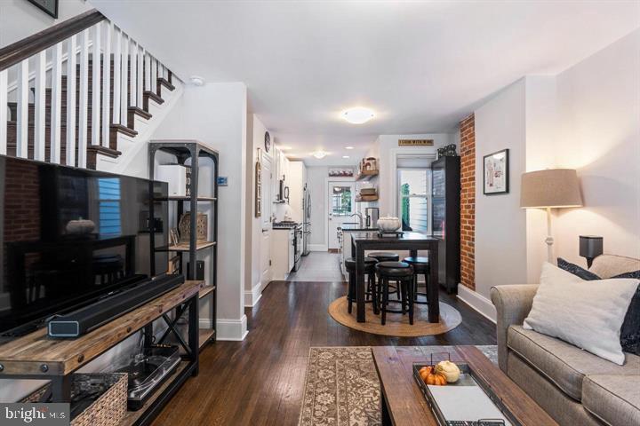 419 North Olive Street Media, PA 19063 - Photo 5 of 31 a living room with furniture and a flat screen tv