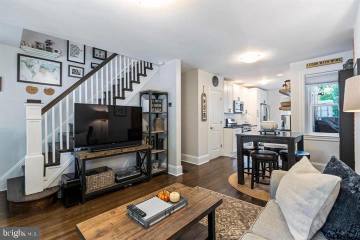 419 North Olive Street Media, PA 19063 - Photo 6 of 31 a living room with furniture and a flat screen tv