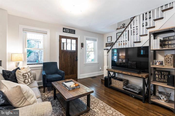 419 North Olive Street Media, PA 19063 - Photo 7 of 31 a living room with furniture and a flat screen tv