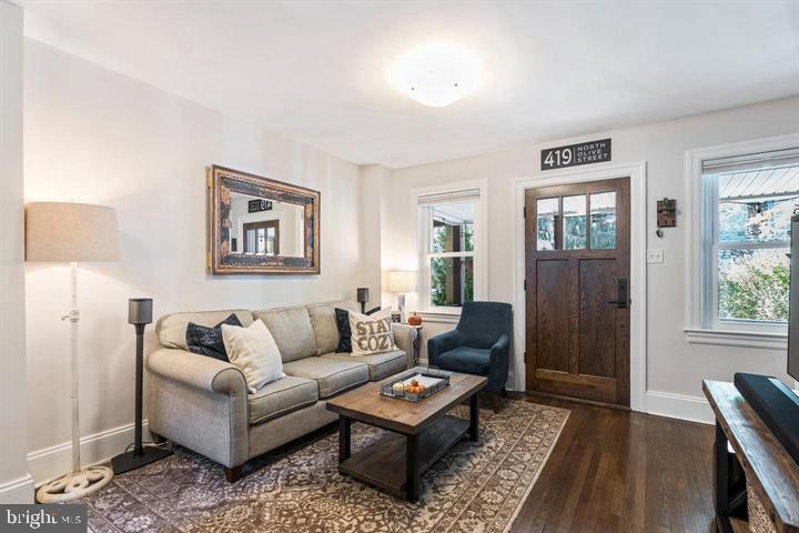 419 North Olive Street Media, PA 19063 - Photo 8 of 31 a living room with furniture and a window
