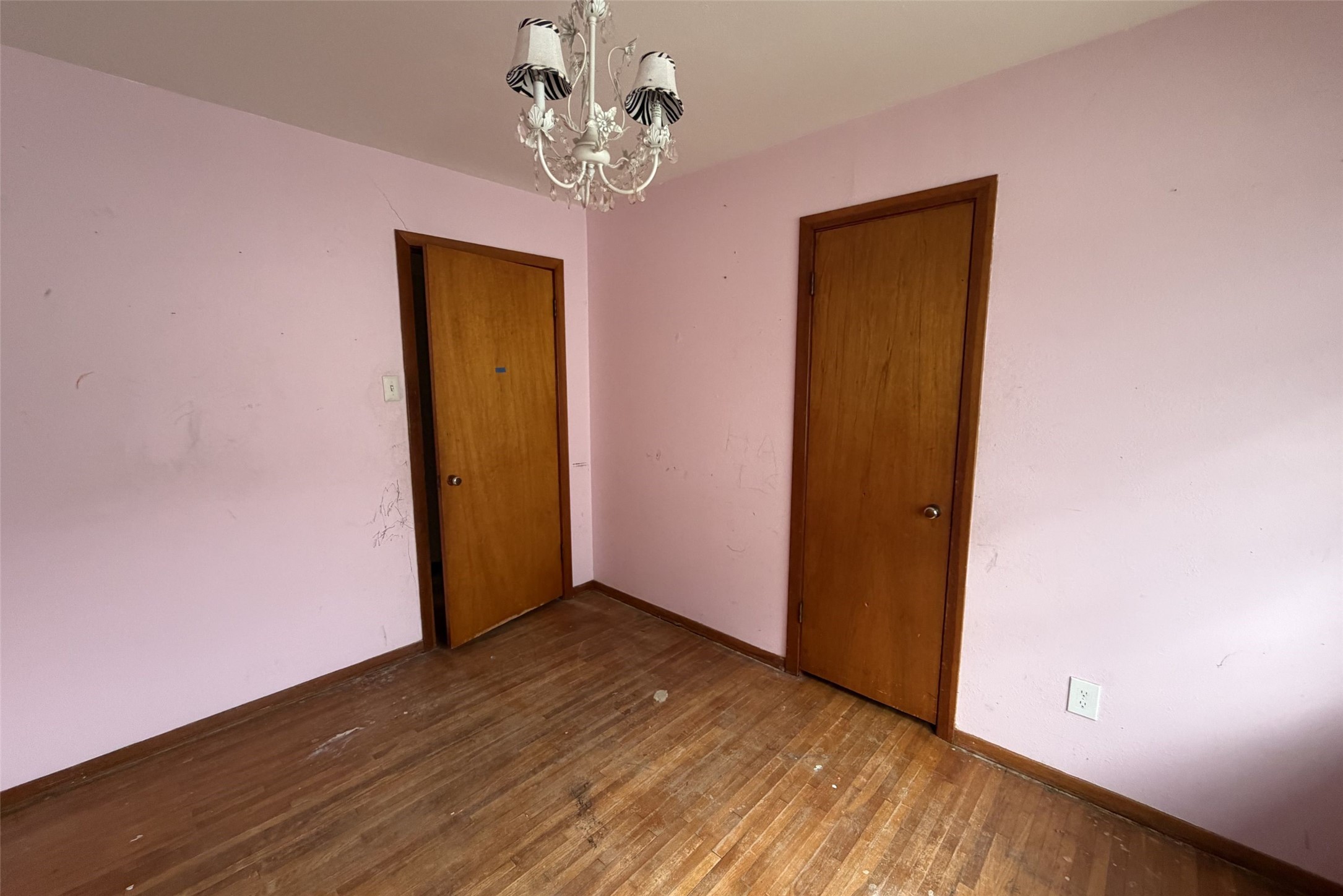 3207 Washington Street Pasadena, TX 77503 - Photo 7 of 9 an empty room with wooden floor and a window
