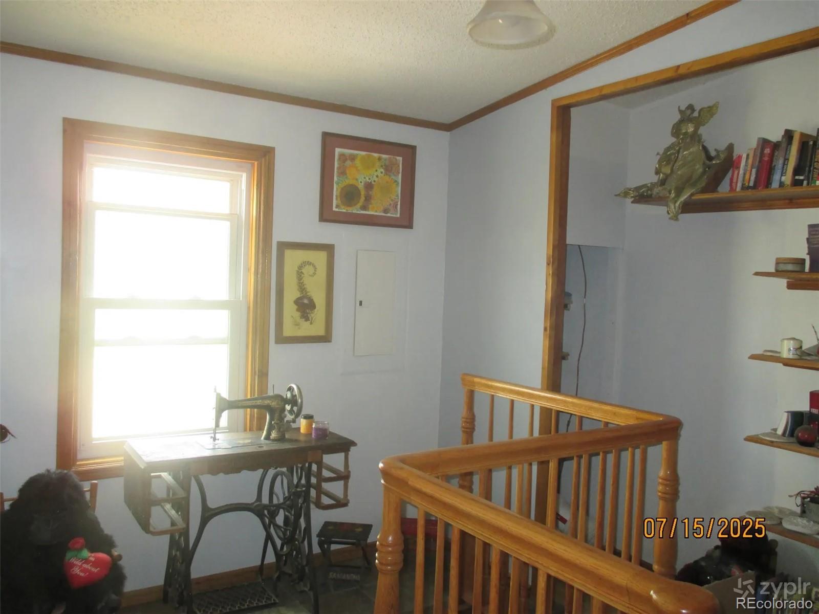 15 Sloan Road Livermore, CO 80536 - Photo 17 of 27 a view of a bedroom with furniture window and wooden floor