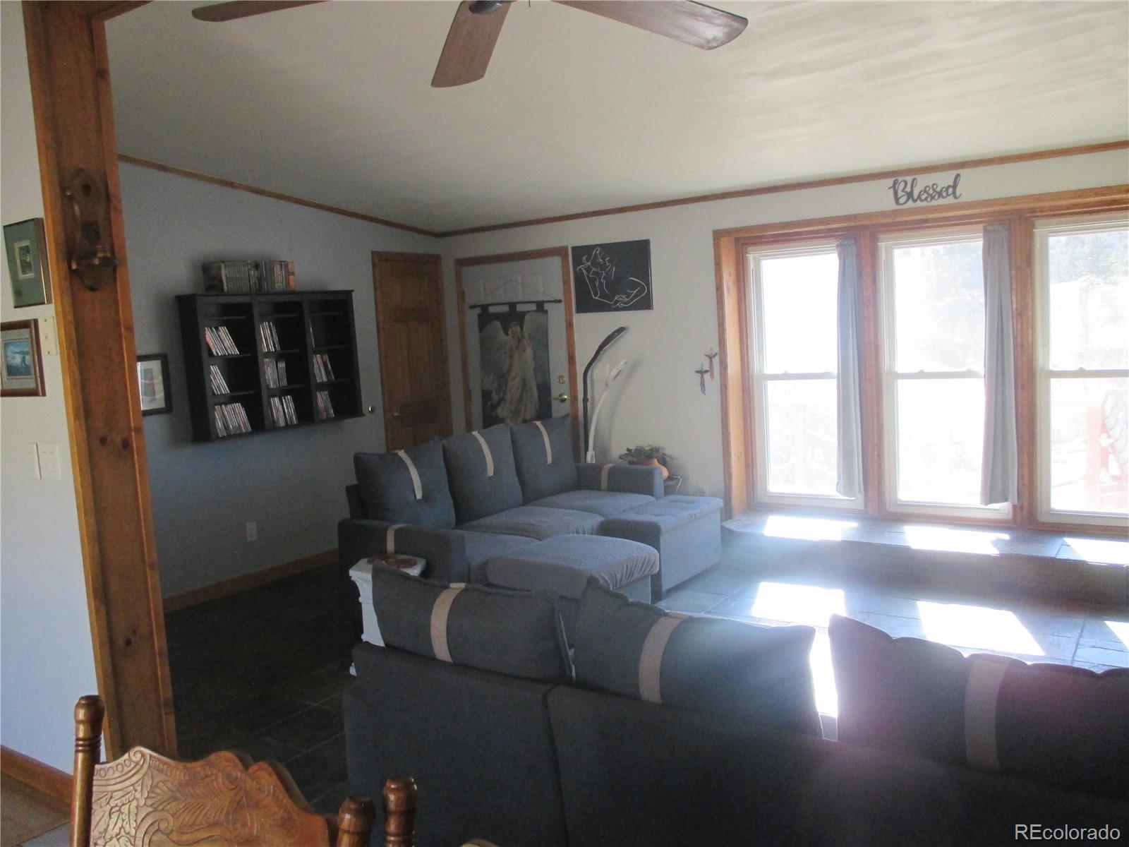 15 Sloan Road Livermore, CO 80536 - Photo 25 of 33 a view of a livingroom with furniture and windows