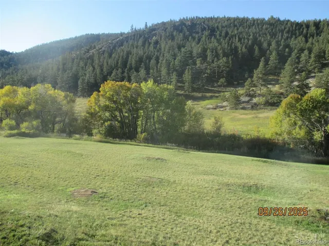 a view of lake with green space