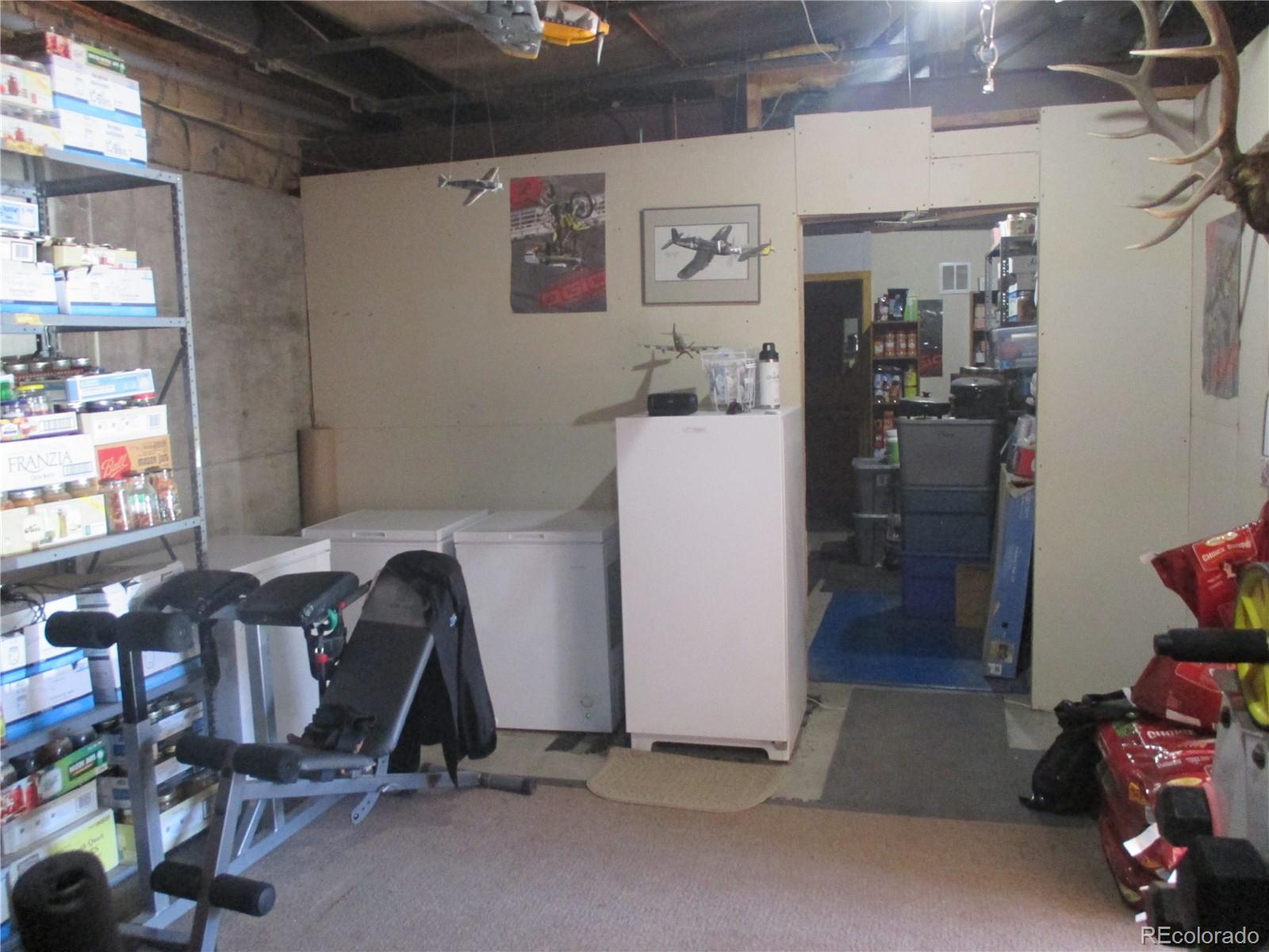 15 Sloan Road Livermore, CO 80536 - Photo 27 of 33 a view of a room with gym equipment