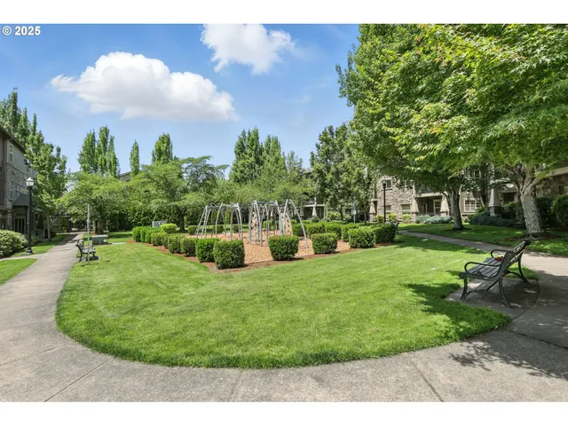 a view of a swimming pool with a yard