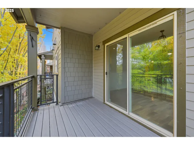 a utility room with cabinets washer and dryer