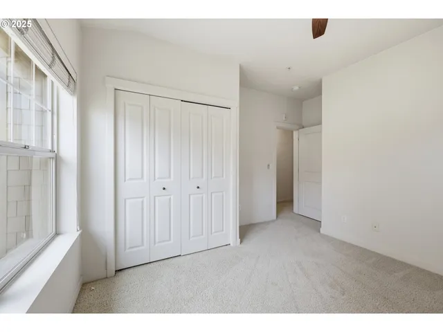 a work room with furniture and a window