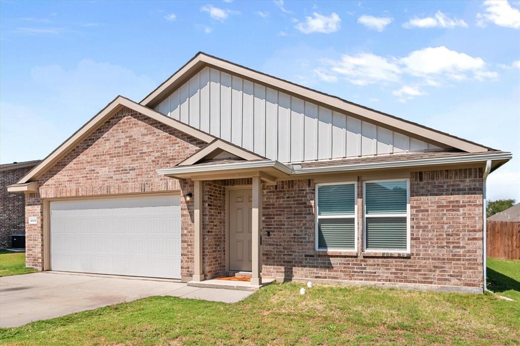 909 Avagail Avenue Springtown, TX 76082 - Photo 2 of 26 a front view of a house with garden