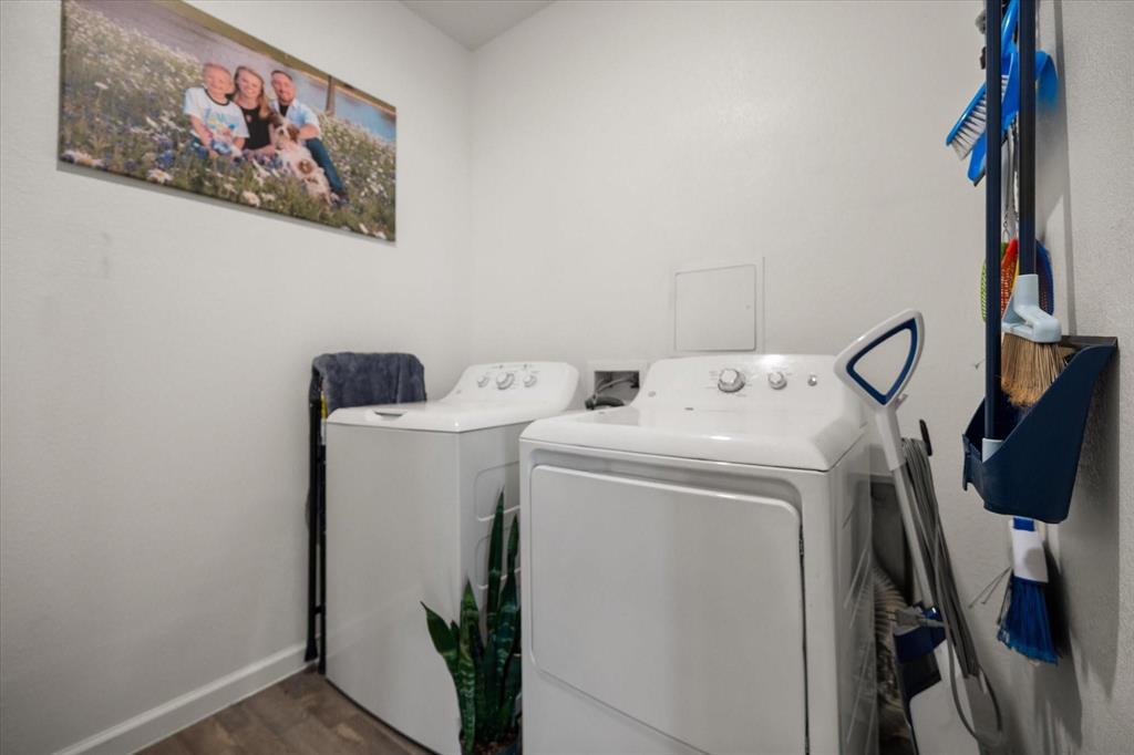 909 Avagail Avenue Springtown, TX 76082 - Photo 23 of 26 a utility room with dryer and washer