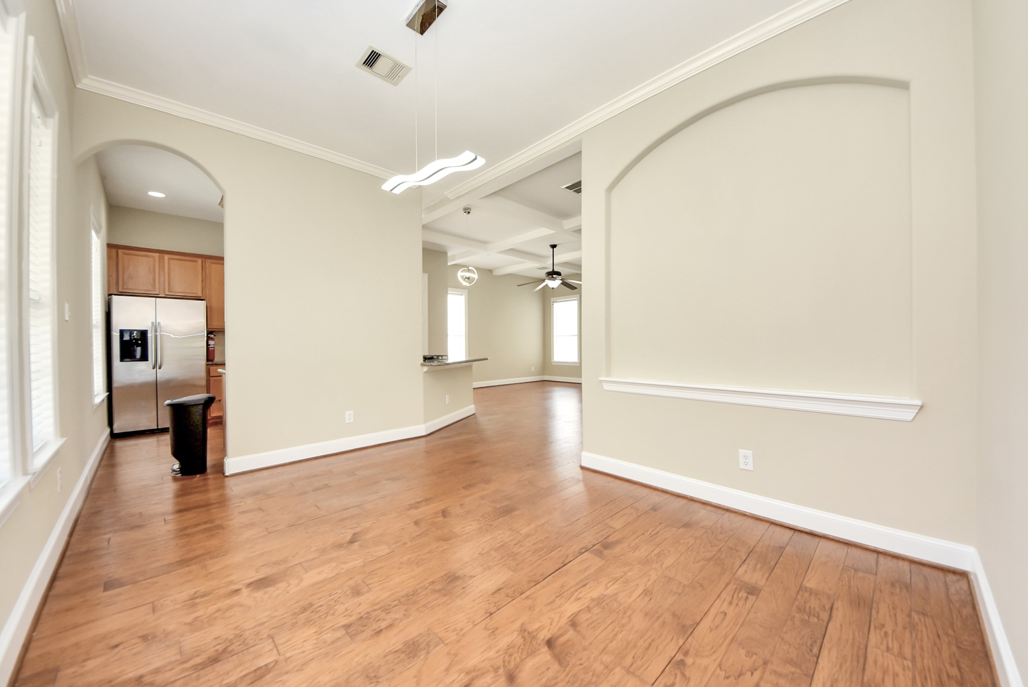 2119 Stuart Street Houston, TX 77004 - Photo 18 of 37 Featuring an art niche, crown molding and a beautiful hanging light fixture, residents and guests are sure to enjoy making memories here!