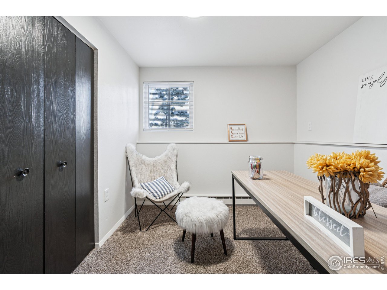 2408 Orchard Place Fort Collins, CO 80521 - Photo 6 of 10 a view of a dining room with furniture and wooden floor