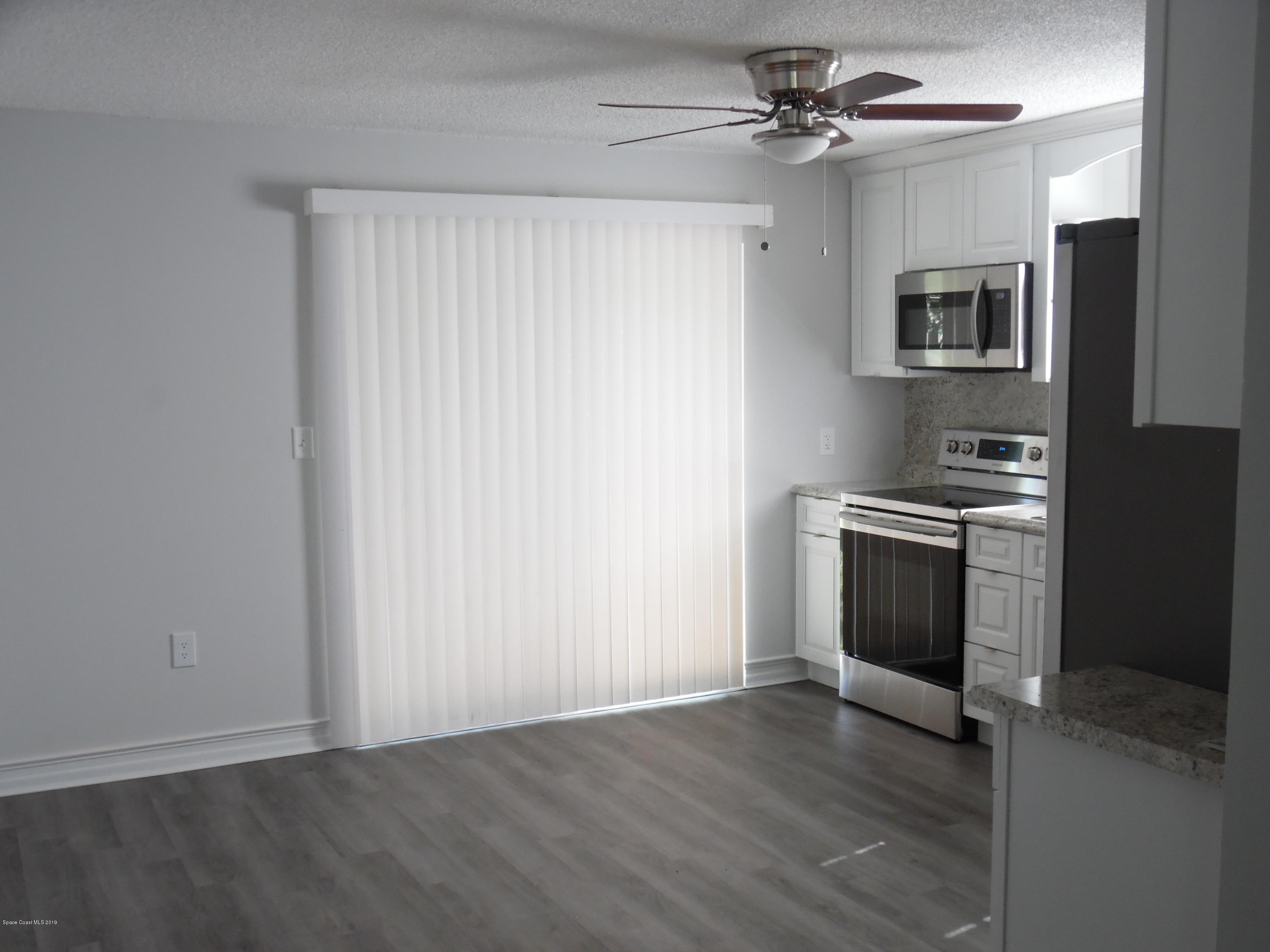 431 Count Street Melbourne, FL 32901 - Photo 5 of 15 From L.R. to LARGE Kitchen