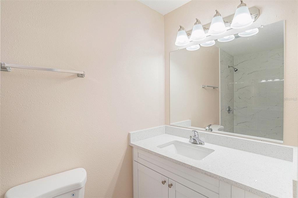 2527 Ridge Top Way Valrico, FL 33594 - Photo 21 of 29 a bathroom with a sink vanity and a mirror