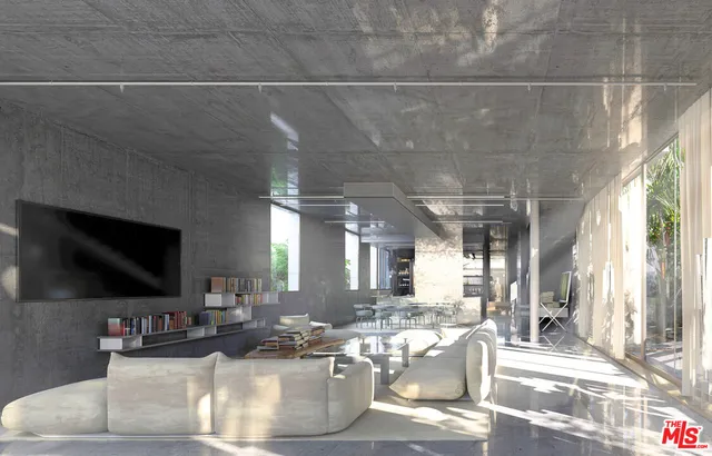 an aerial view of a house with a yard and garden